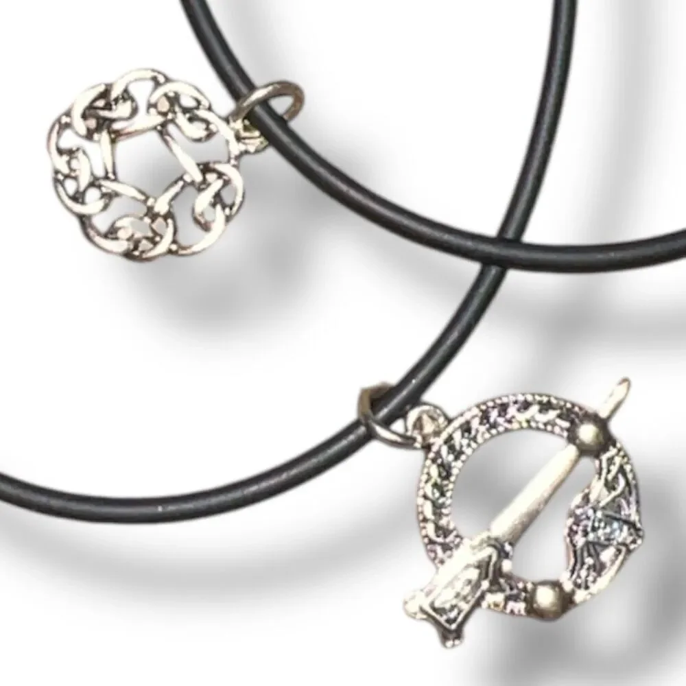 Set of Two Celtic-Inspired Black Jelly Bracelets with Silver Tone Charms